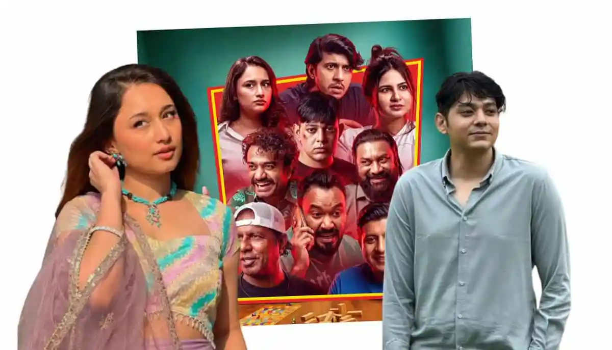 দুটি মানুষ একটি ছবি দেখছেন, পেছনে একটি বড় ছবি রয়েছে।. Channel i News - চ্যানেল আই নিউজ