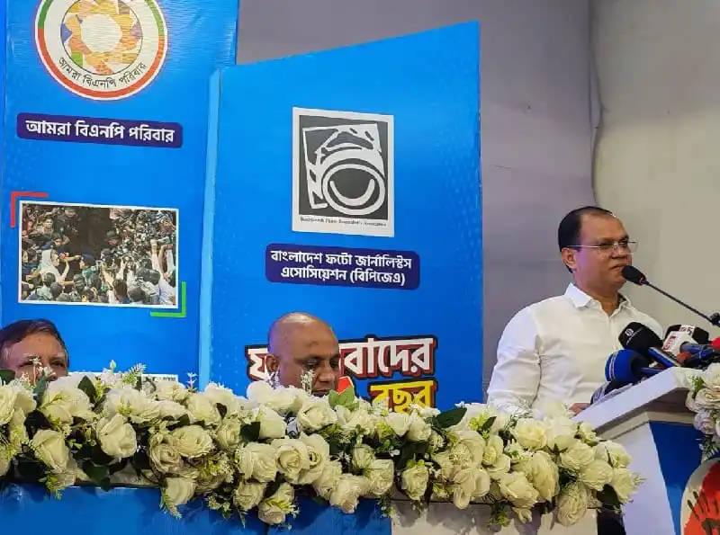 আতিকুর রহমান রুমন বক্তৃতা দিচ্ছেন, পেছনে বাংলাদেশ কাস্টমস অ্যাসোসিয়েশনের লোগো. Channel i News - চ্যানেল আই নিউজ
