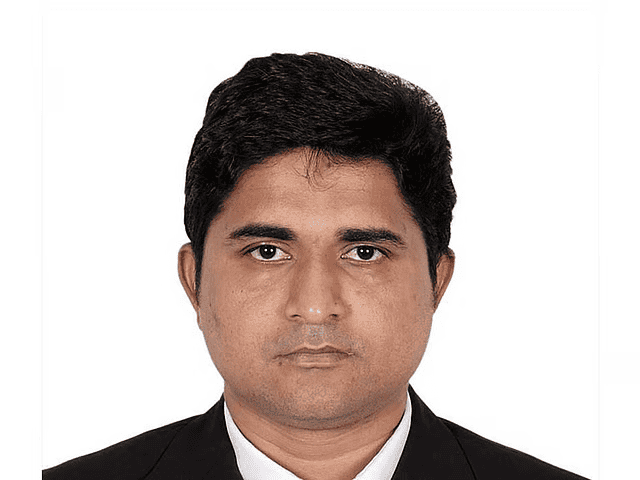 Professional portrait of a Bangladeshi man in formal attire. Channel i News - চ্যানেল আই নিউজ