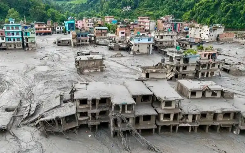 Flood-affected area with damaged buildings and mudslides in Bangladesh. Channel i News - চ্যানেল আই নিউজ