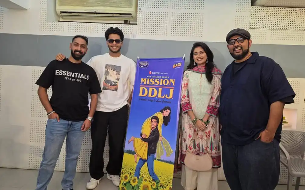 চারজন মানুষ একটি বোর্ডের সামনে দাঁড়িয়ে আছেন।. Channel i News - চ্যানেল আই নিউজ